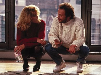 Meg Ryan e Billy Crystal seduti uno accanto all’altra nel film Harry ti Presento Sally. Chiara Veccia per CanadaUsa