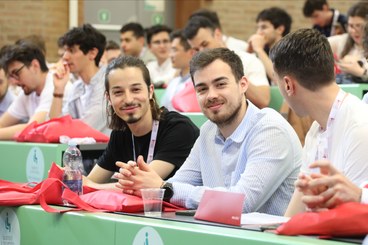 Students smiling in a classroom