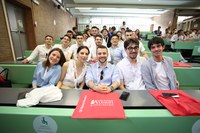 Students smiling in a classroom