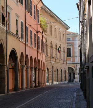 A street with houses and porticoes in Cesena city centre