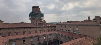 A view over Piazza Scaravilli and Torre della Specola from the Economics Building in Via Zamboni, Bologna