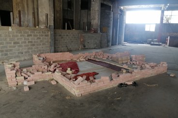 “Makeshift praying area” at Ladopolous